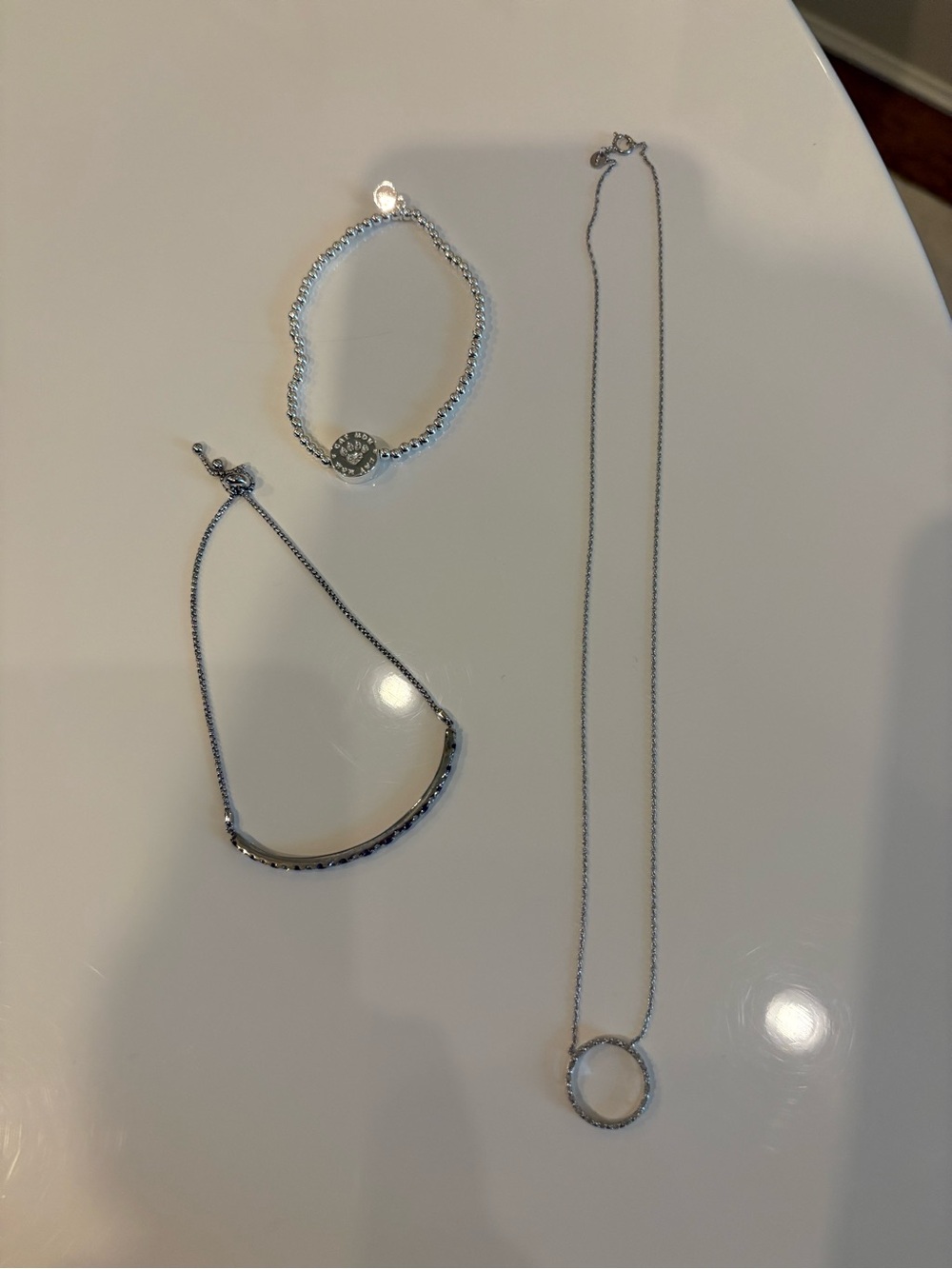 Sterling Silver Circle Pendant Necklace and Two Silver Bracelets Set